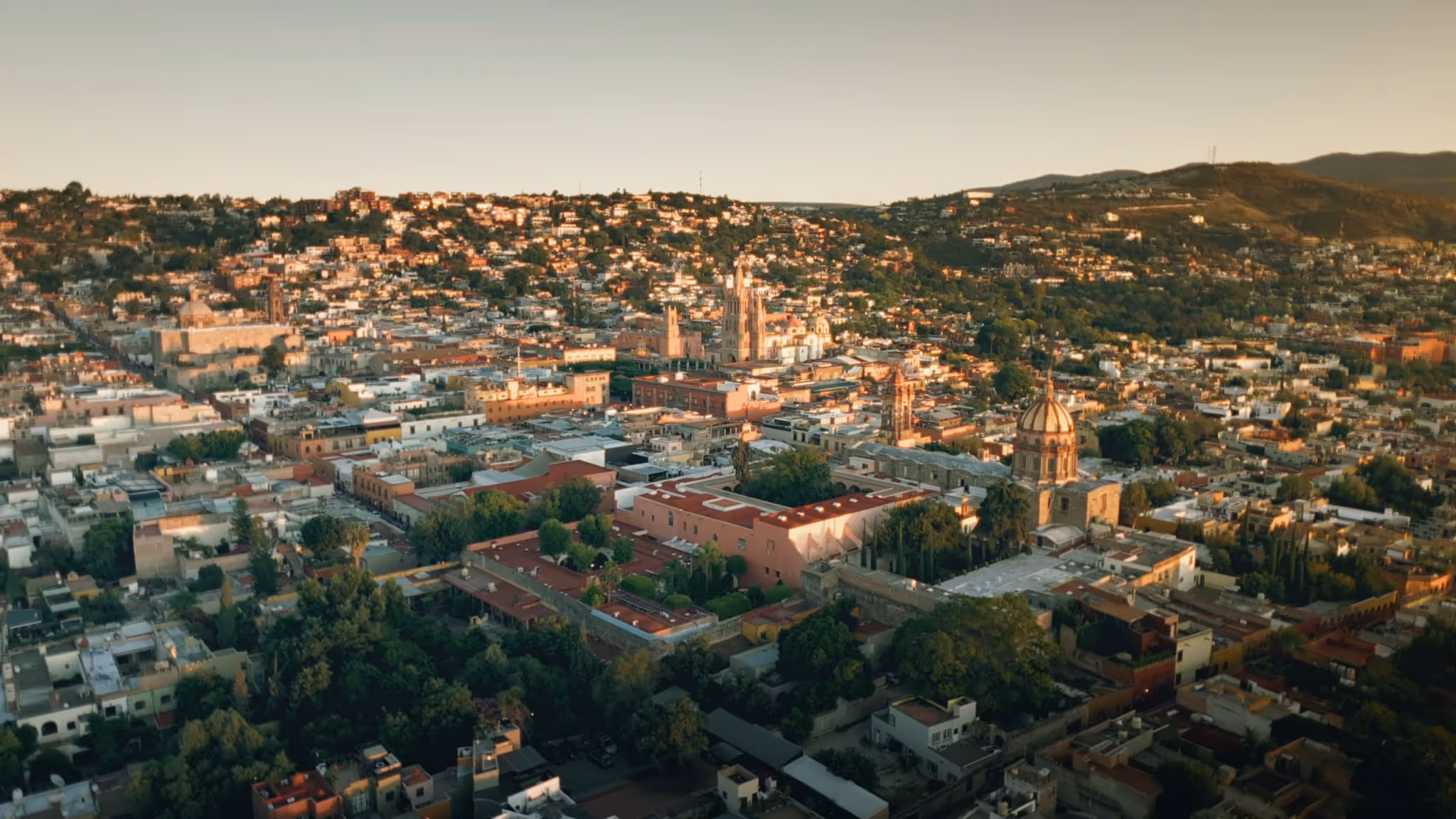Aerial view over the historic center of San Miguel de Allende at golden hour